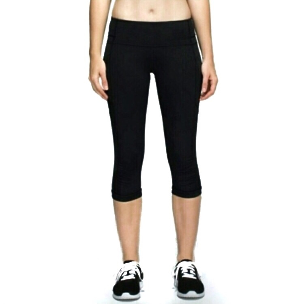 Lululemon Classic Black Mid Rise Crop Leggings with Small Strip Down the Side